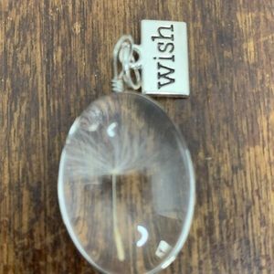 Blow Flower because I can’t think of it’s name. Charm. comes with 21 inch chain